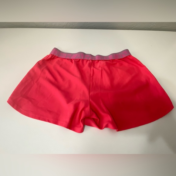 Under Armour loose orange/red shorts - Picture 3 of 3